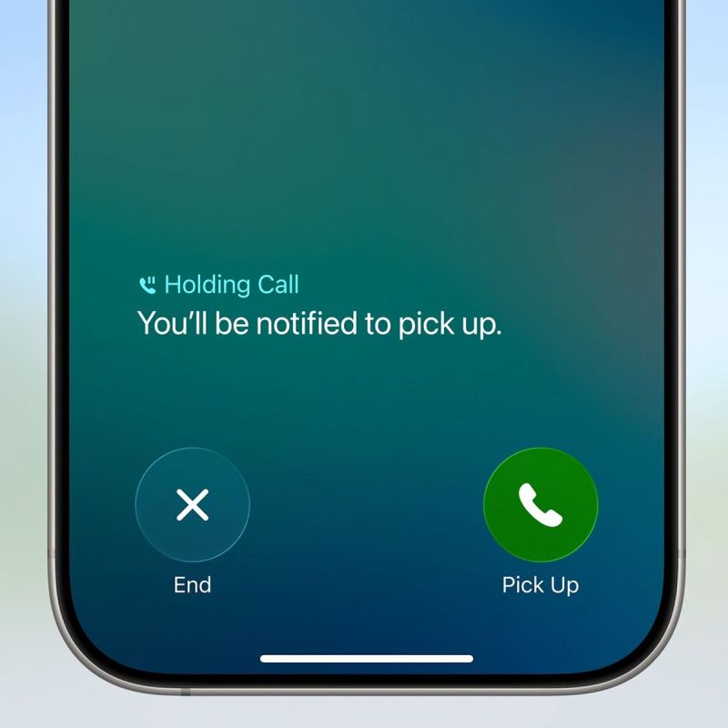iPhone screen showing a call on hold with End and Pick Up options and a notification message.